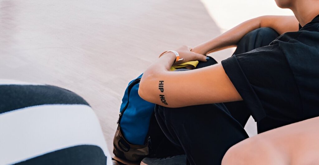 blackwork name tattoo cover up