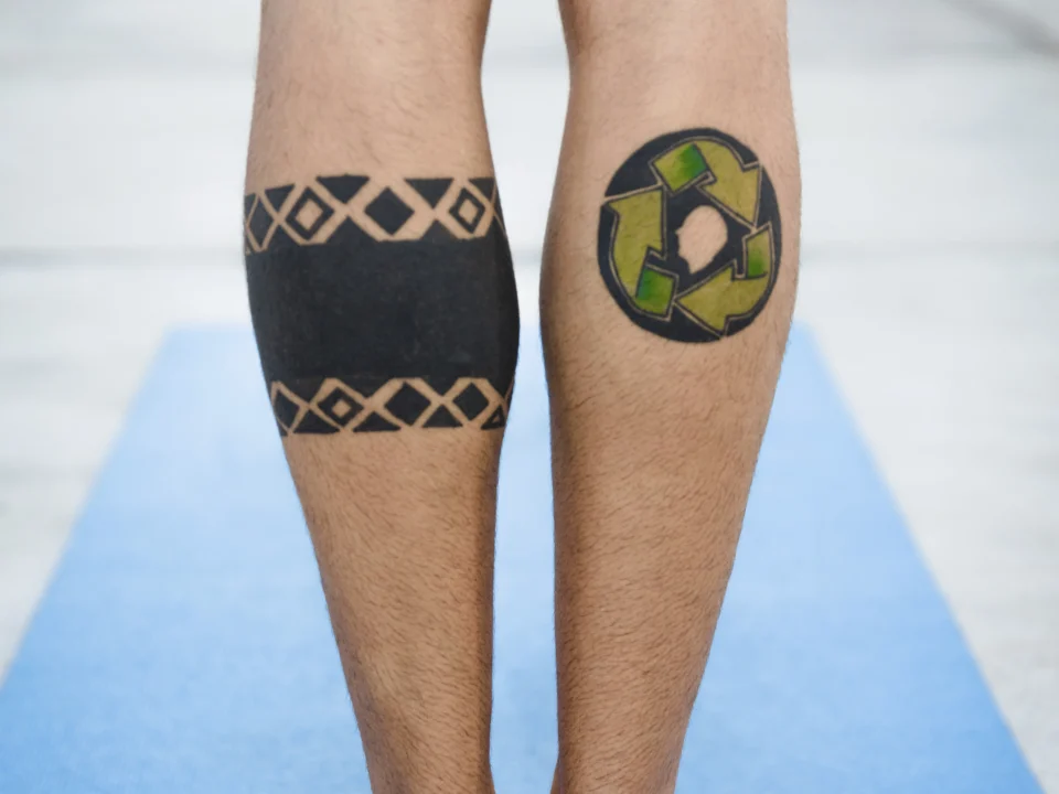 hawaiian tribal leg tattoo