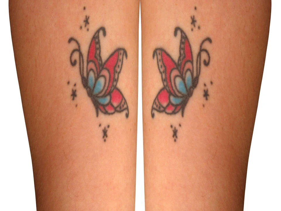 realistic butterfly tattoo design with deep symbolic meaning