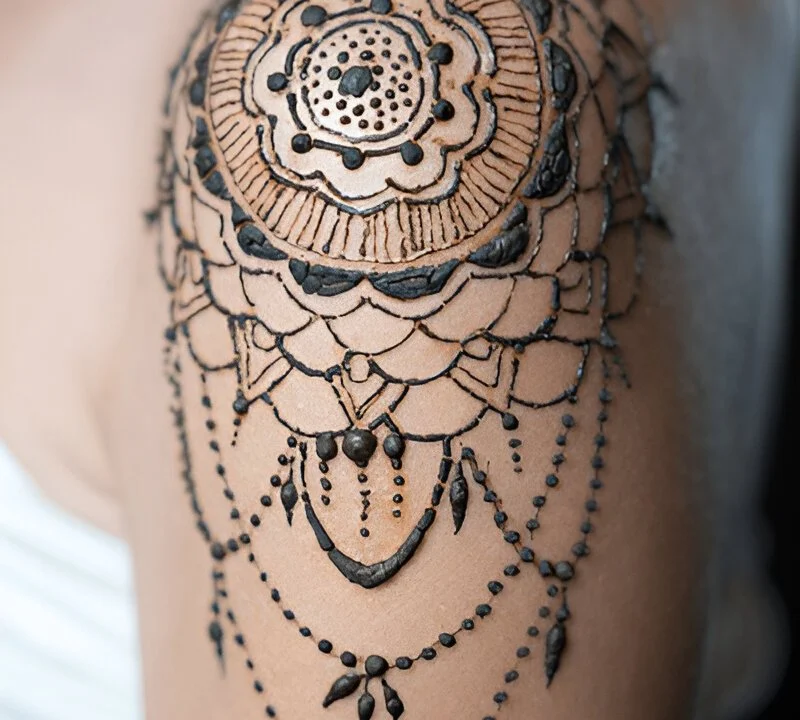 Mandala and geometric sleeve tattoo filler details