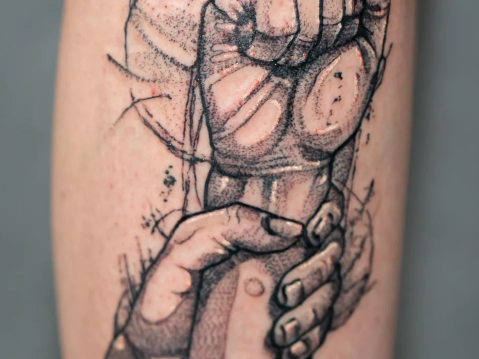 Linework filler tattoos used to smoothly transition between traditional tattoo motifs