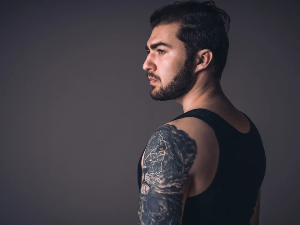 blackwork shoulder filler tattoo