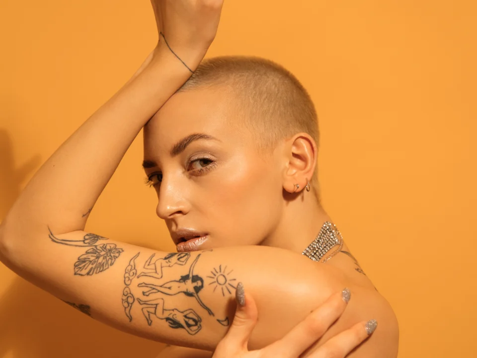 bold black shoulder tattoo filler
