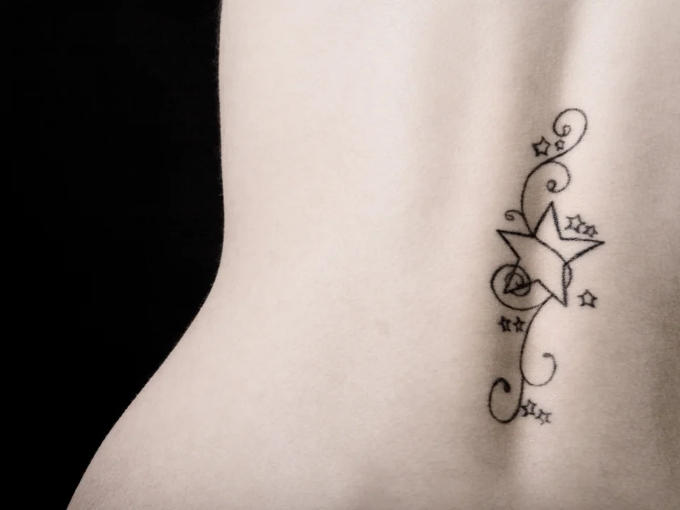 fine line tattoo filler ideas using tiny star designs