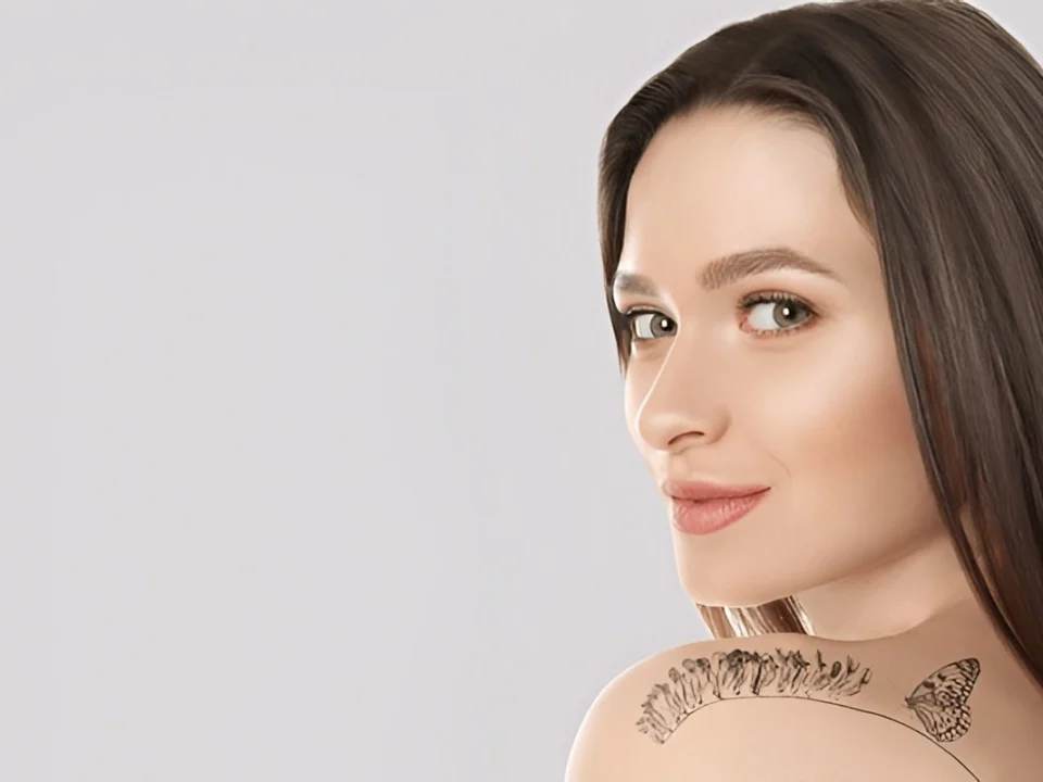 tattoo of butterflies flying design symbolizing freedom and transformation